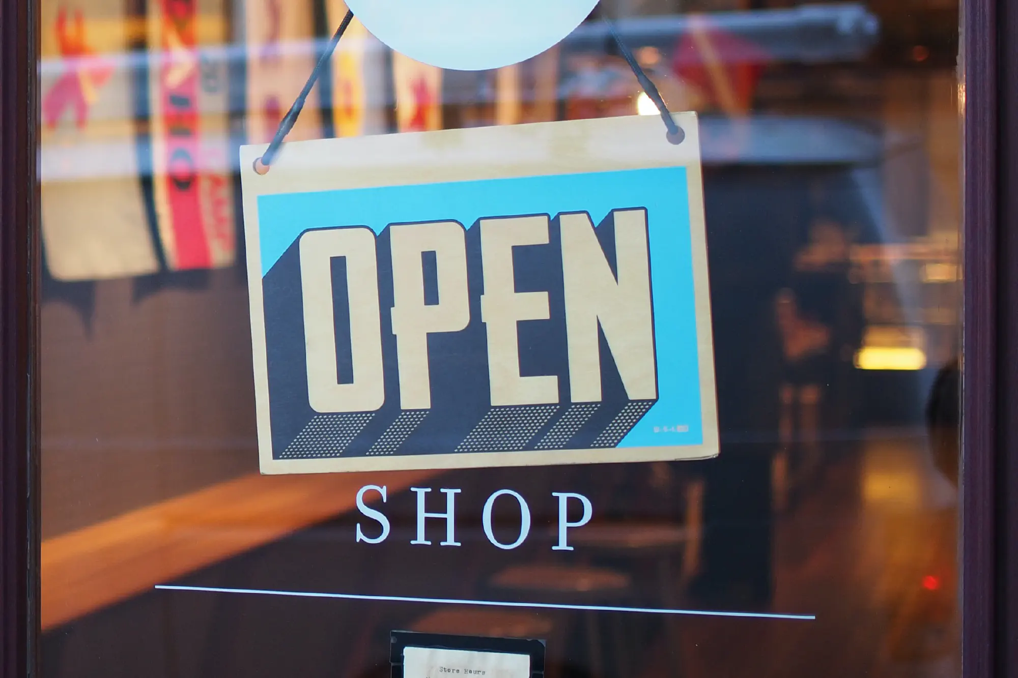 'Open' sign in a shop window
